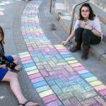 Volunteers decorate the entrance with rainbow patterns for RMG Fridays: Pride, 2017.