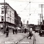 Looking north up Simcoe Street at Four Corners, c. 1920