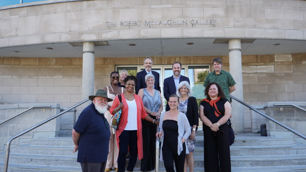 Staff members standing along the front steps of the Robert McLaughlin Gallery at the Annual General Meeting. Oshawa, June 16, 2022.